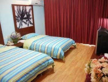 Xinlong Holiday Hotel Jiaozhou ภายนอก รูปภาพ